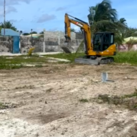 Thimarafushi sunset park an excavator digging land