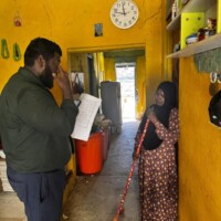 Thimarafushi MCEP survey team with a local Maldivian old woman