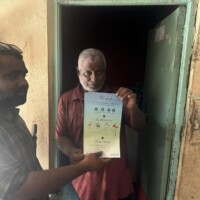 Thimarafushi MCEP survey team with local Maldivian man