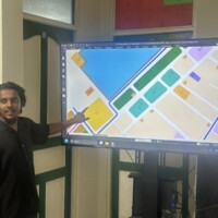 Council staff explaining map of island